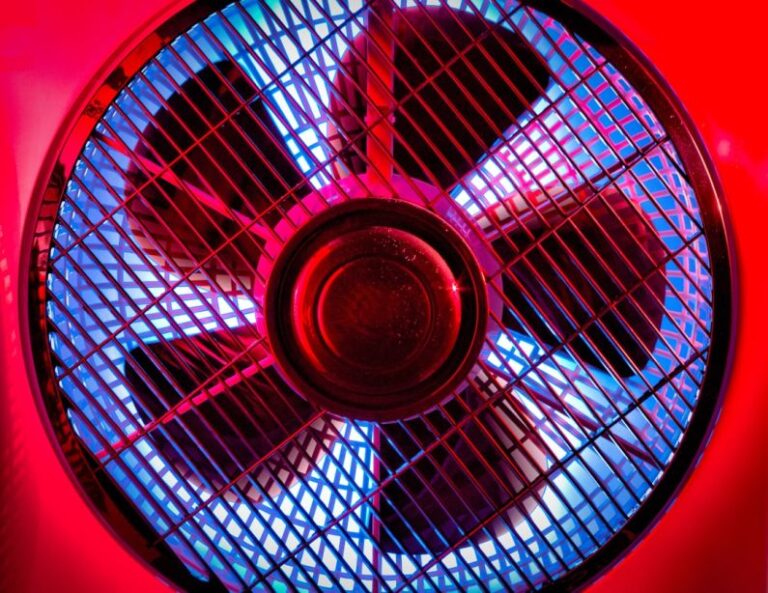 Ventilator - black and gray fan on brown wooden table