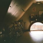 Attic Home - black bicycle near brown wooden cabinet