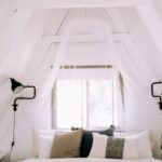 Attic Home - Pillows on a Bed in a Bedroom in the Attic