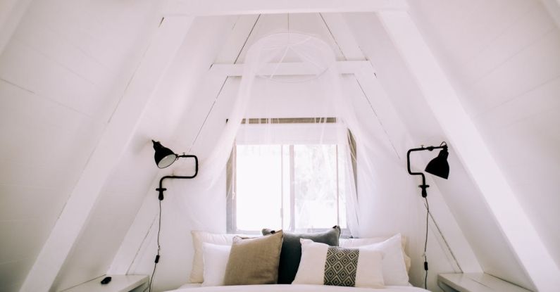 Attic Home - Pillows on a Bed in a Bedroom in the Attic