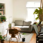 Attic Home - gray fabric loveseat near brown wooden table