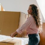 Attic Home - Focused diverse couple relocating in new house