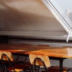 Attic Window - A Table and Chairs in an Attic