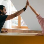 Attic Bedroom - Exited diverse couple relocating in new apartment