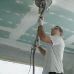 Renovation Projects - Man Polishing the Ceiling