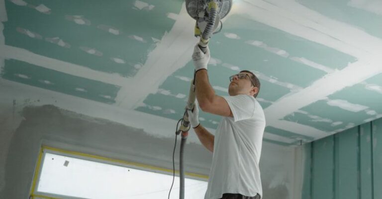 Renovation Projects - Man Polishing the Ceiling