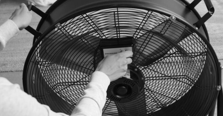 Ventilation Fan - Grayscale Photo of Person Turning on an Industrial Fan