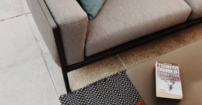 Carpet Tiles - White and Brown Book on Table Near Couch