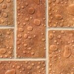 Waterproof Flooring - Water Drops on Brown Tiles