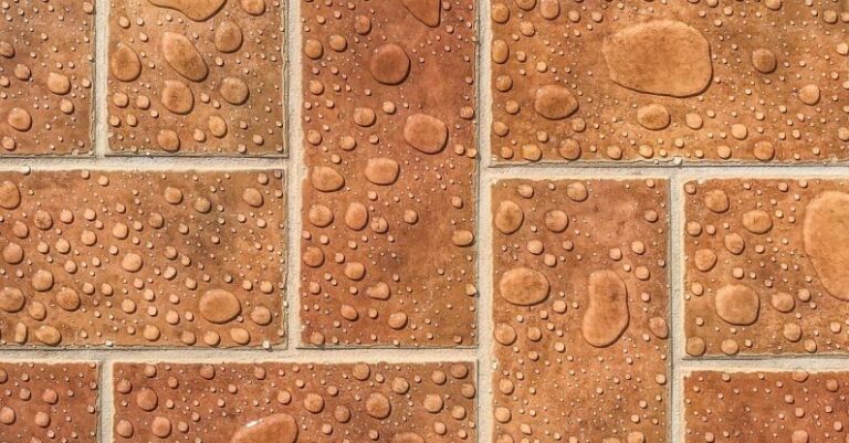 Waterproof Flooring - Water Drops on Brown Tiles